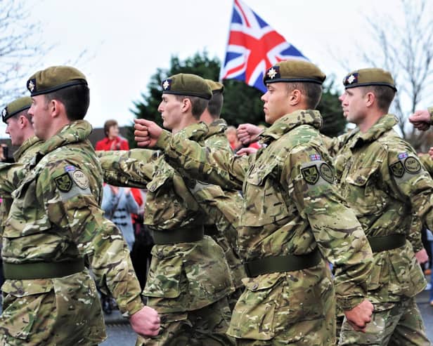 A welcome home parade in Castlereagh for the Irish Guards in 2011 after their tour of Afghanistan. Photo: Colm Lenaghan/Pacemaker