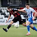 Crusaders defender Josh Robinson and Coleraine's Eamon Fyfe during Saturday's game at Seaview.