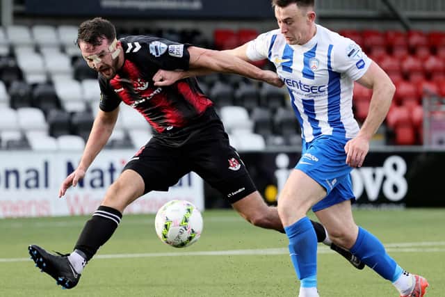 Crusaders defender Josh Robinson and Coleraine's Eamon Fyfe during Saturday's game at Seaview.