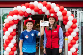 St. Joseph’s Primary School pupil Daíthí McGeary is pictured with Gillian Hunter, store manager at Eurospar Donaghmore, who welcomed Daíthí to the store’s official opening after he wrote to the store to say he’d like to work in a Spar. Credit Ricky Parker Photography