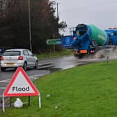 Motorist struggle threw the flooding at the Nutt’s Corner Roundabout near Crumlin after heavy downpours. Pic Colm Lenaghan/Pacemaker