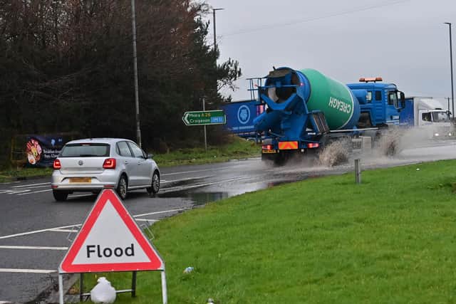 Motorist struggle threw the flooding at the Nutt’s Corner Roundabout near Crumlin after heavy downpours. Pic Colm Lenaghan/Pacemaker