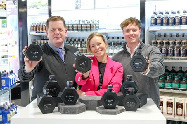 Giants Basalt Rock Gin, distilled in Northern Ireland, has landed at Belfast City Airport’s World Duty Free store. Pictured is Michael Jackson, head of commercial at Belfast City Airport, James Richardson, owner of Basalt Distillery and Gillian O’Neill, store manager at World Duty Free at Belfast City Airport