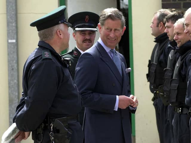PACEMAKER BFST 13-06-2000: Prince Charles chats with RUC Drug Squad officers at Ballymena RUC station