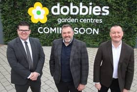 Landlord Lotus Property officially hands redeveloped site over to garden retailer. Pictured are Junction Centre director Chris Flynn, Lotus Property managing director Alastair Coulson and Dobbies CEO Graeme Jenkins
