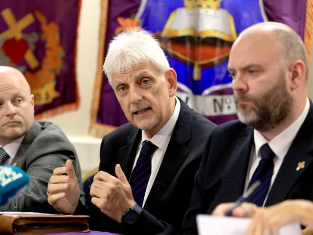 Loyalist activist Jamie Bryson, Portadown District Master Nigel Dawson and Portadown deputy District Master Alastair Power, during a press conference at Carleton Street Orange Hall in Portadown, Co Armagh, announcing their next steps in relation to the Drumcree parade. Pic: Liam McBurney/PA Wire