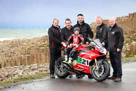 NW200 race boss Mervyn Whyte and Clerk of the Course Stanleigh Murray with sponsors William McCausland of fonaCAB and Gary Nicholl of Nicholl Oils, plus six-time Superbike winner Glenn Irwin and his son Freddie at the Giants Causeway this week. Picture: Stephen Davison.