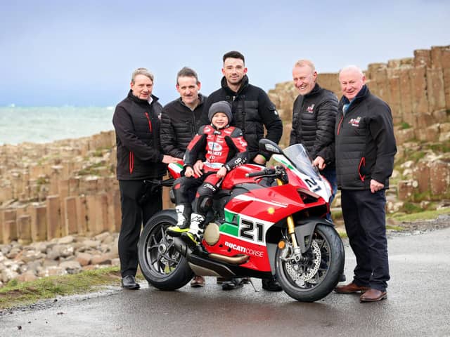NW200 race boss Mervyn Whyte and Clerk of the Course Stanleigh Murray with sponsors William McCausland of fonaCAB and Gary Nicholl of Nicholl Oils, plus six-time Superbike winner Glenn Irwin and his son Freddie at the Giants Causeway this week. Picture: Stephen Davison.