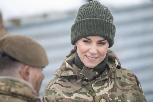The Princess of Wales, Colonel of the Irish Guards, meet members of the 1st Battalion Irish Guards, for the first time since receiving the honorary appointment last year, during a visit to the Salisbury Plain Training Area in Wiltshire, to hear first-hand about the work that the Irish Guards are carrying out