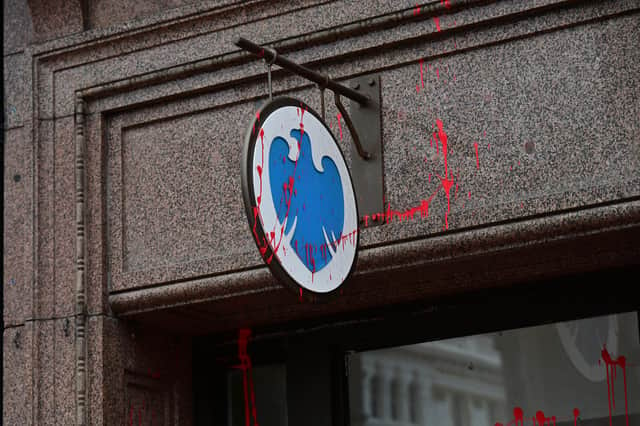 Red paint smeared over Barclay's Bank