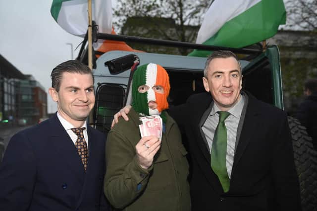 DJ Provai with lawyers Darragh Mackin (left) and Gavin Booth (right), after the conclusion of Kneecap's court case. Photo: Mark Marlow/PA Wire