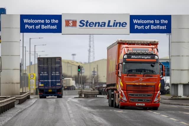 Freight lorries travelling through the Port of Belfast.