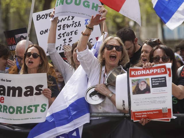People take part in a pro-Israel protest during pro-Palestine march in central London yesterday (Saturday). Photo: Jeff Moore/PA Wire