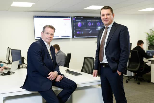 Nihon Cyber Defence (NCD), a Japanese leader in cyber security, has responded to an increase in demand for its services by moving to new, bespoke offices in Belfast to accommodate its growing team. Pictured are Ally Burns, NCD’s head of incident management, UK & Europe and Dougie Grant, managing director for Europe, at the company’s new headquarters in Belfast