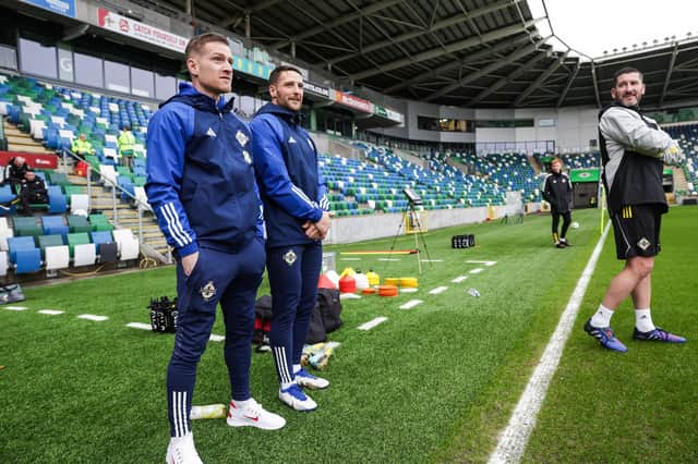 Northern Ireland’s Steven Davis and Conor Washington watching the weekend Belfast training session. (Photo by William Cherry/Presseye)