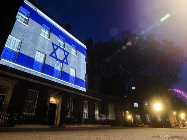 The Israeli flag shines on Ten Downing Street in solidarity with the people of Israel. The Government has asked all UK government buildings to do likewise.