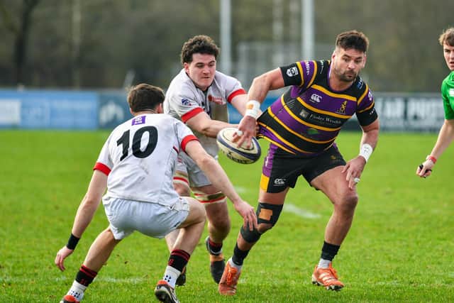 Instonians player/coach Paul Pritchard (right). (Photo by Andrew McCarroll/Pacemaker Press)