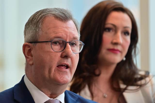 DUP Leader Jeffrey Donaldson speaks to the media with Party Members Gavin Robinson and Emma Little-Pengelly  after a meeting with Taoiseach Micheál Martin  at Grand Central Hotel in Belfast.