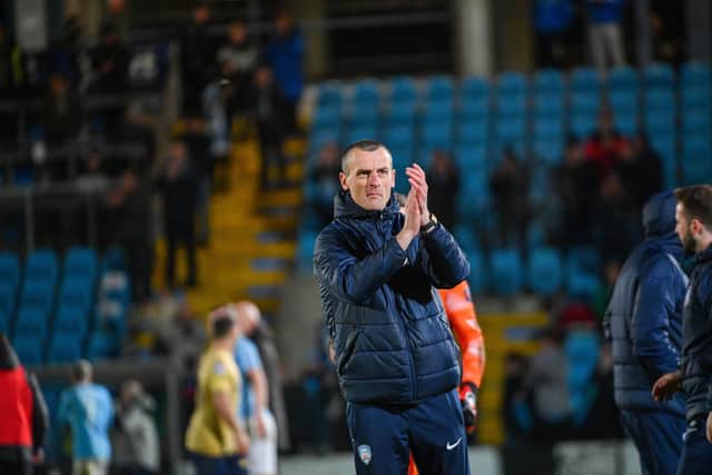 Oran Kearney claps in appreciation to the travelling support as the Bannsiders beat Ballymena United on spot kicks in the BetMcLean Cup