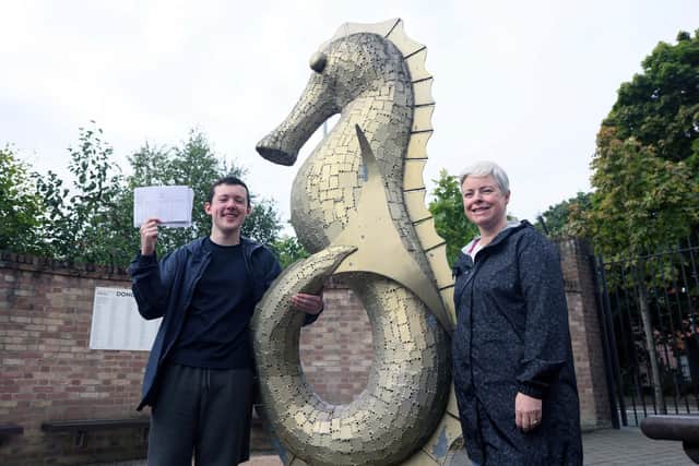Royal Belfast Academical Institution pupil Nathan McCarron celebrates achieving nine A Star and two A results in his GCSE results with his mum, Mary.