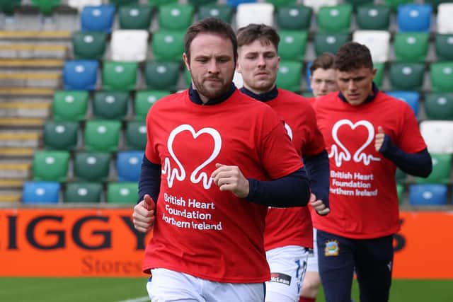 Linfield's Jamie Mulgrew donned a specially designed t-shirt to raise awareness in conjunction with a partnership between the Northern Ireland Football League and the British Heart Foundation