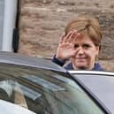 First Minister Nicola Sturgeon leaving Bute House in Edinburgh by the back door after she announced that she will stand down as First Minister for Scotland after eight years
