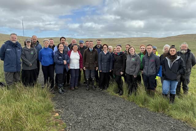 DAERA Minister Andrew Muir at the launch of the Northern Ireland Peatland Strategy 2040 on Divis Mountain on the outskirts of Belfast with members of the Peatland Collaborative Network. Pic: DAERA/PA Wire