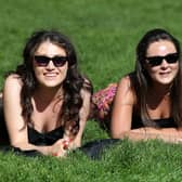 General view of members of the public in Botanic Gardens, Belfast this afternoon as the Northern Ireland experienced warm weather over the weekend. 

(L-R)  Aoibheann Maguire and Kate Welsh

Photograph by Declan Roughan