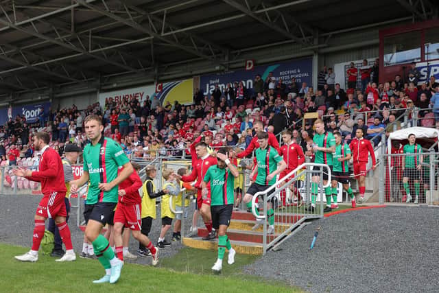 Portadown and Glentoran players take to the field at Shamrock Park for Saturday's opening game of the Sports Direct Premiership campaign. (Photo by JonathanPorter/INPHO/PressEye)