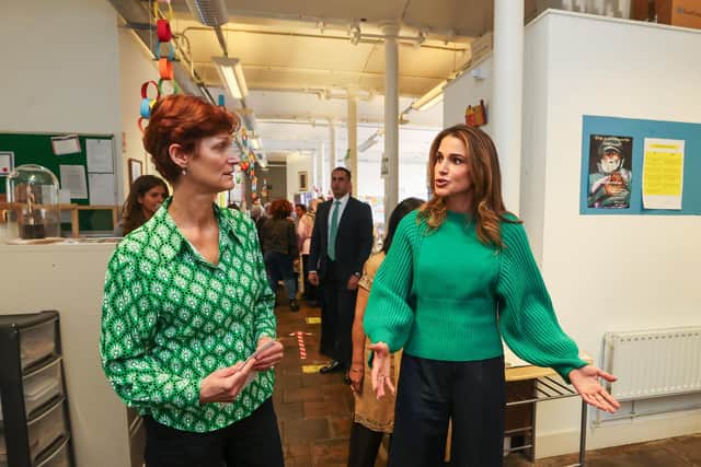 Queen Rania of Jordan (right) speaking with centre manager Pauline Kersten after a visit to meet refugees from the Conway Education Centre at Conway Mill