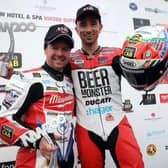 Glenn Irwin (right) and Alastair Seeley posed for a picture together after their earlier Superbike clash at the NW200
