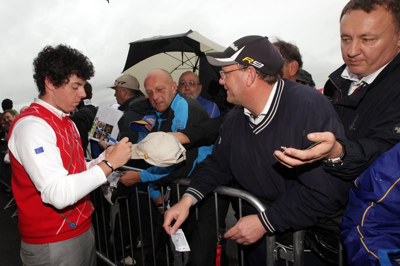 Rory McIlroy signing autographs for fans in Wales. (Photo by Andrew Redington/Getty Images)