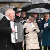 Family and friends during the anniversary service of the Teebane bombing outside Cooktown in Co Tyrone on Sunday. Photo Colm Lenaghan/Pacemaker