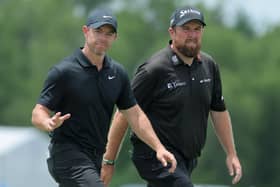 Rory McIlroy (left) and Shane Lowry during the second round of the Zurich Classic of New Orleans at TPC Louisiana. (Photo by Jonathan Bachman/Getty Images)