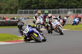 Richard Cooper (BPE by Russell Racing Yamaha) leads the pack on the opening lap of the Invitation Supersport race at Bishopscourt yesterday