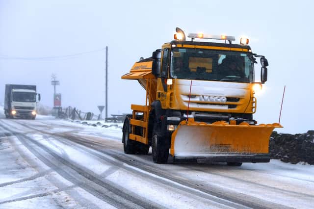 A gritter and snow plough. Photo: Peter Byrne/PA Wire