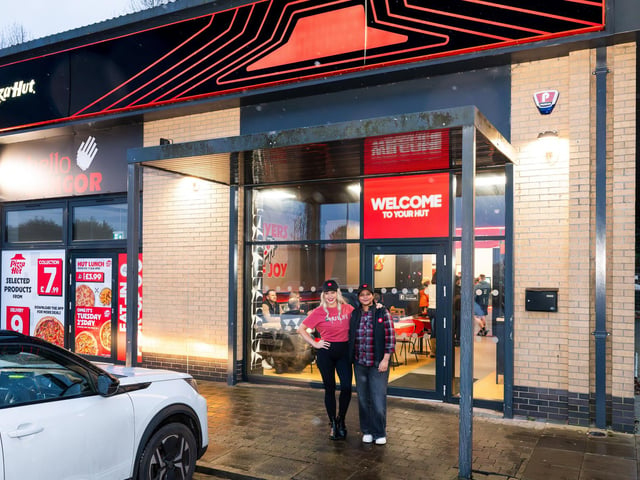 Pizza Hut restaurant manager Ms Bhavishya Chauhan with former Miss Great Britain Gemma Garrett at the opening of the new Pizza Hut in Bangor