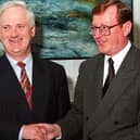 The then Ulster Unionist Party MP David Trimble, shakes hands with Taoiseach John Bruton at the government buildings in Dublin in October 1995, the month after Mr Trimble became his party leader. A devout Roman Catholic, Mr Bruton's repudiation of IRA terror was as much on moral as political grounds