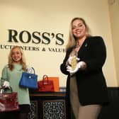 Jewellery experts, Philippa Harty and Lauren Frayne from Ross’s Auctioneers and Valuers with the Elizabeth Taylor bracelet and three exclusive Hermes bags which are on display in the jewellery showroom as part of Ross’s centenary celebrations