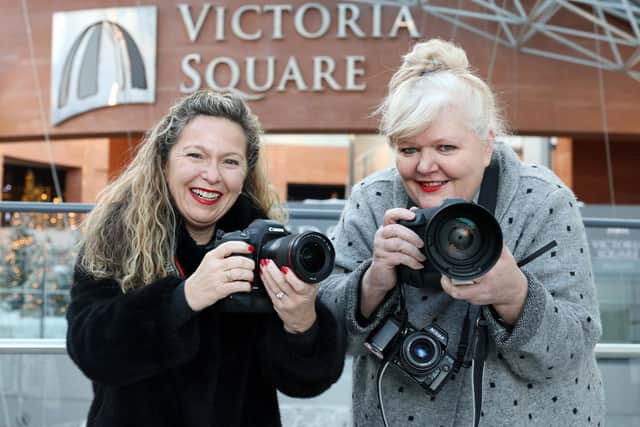 Michelle Greeves, Victoria Square, centre manager and Deirdre Robb, Belfast Exposed CEO, getting ready to perfect their photography skills at the ‘Seeing through
a different lens’ workshops will be held in Victoria Square during January and February 2023.