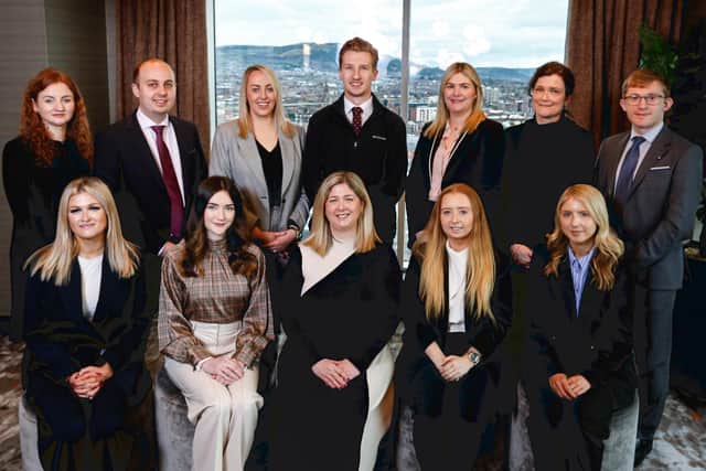 DWF has expanded in Belfast by adding 20 new people to its office this year. The new hires include five newly qualified solicitors. Pictured are Belfast managing partner, Julie Galbraith with the five newly qualified solicitors and the 15 new legal professionals