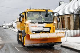 Snow plough and gritting lorry