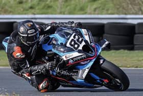 Derek Sheils on the Cosmic Racing BMW M1000RR. (Photo by Derek Wilson)