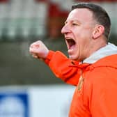 Carrick Rangers manager Stuart King celebrates after his side came from behind to draw 2-2 with Glentoran last weekend. PIC: Andrew McCarroll/ Pacemaker Press