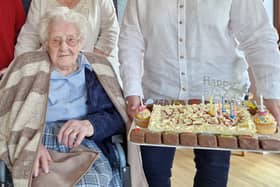 Cath Goodman celebrates with her birthday cake.