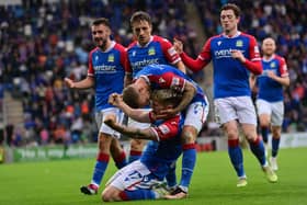 Scorer Chris McKee and Linfield team-mates celebrate during victory over FK Vllaznia at Windsor Park in Belfast. (Photo by Colm Lenaghan/Pacemaker Press)