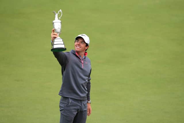 Northern Ireland's Rory McIlroy lifting the Claret Jug after winning the 2014 Open Championship at Royal Liverpool. (Photo by Peter Byrne/PA Wire)
