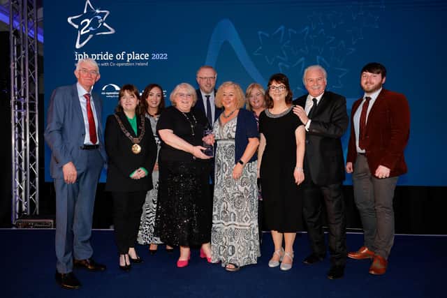 Dublin Lord Mayor Caroline Conroy presents the Pride of Place award to Creative Place Initiative category winners Dundonald Art Corridor