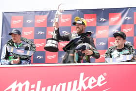 Peter Hickman with the Senior TT trophy after beating runner-up Dean Harrison (left) and Michael Dunlop in the blue riband finale on Saturday