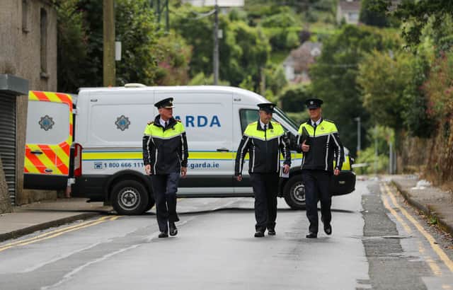 Superintendent Kieran Ruane (right) of Clonmel Garda Station along with senior Gardai, near to the scene of a fatal crash which claimed the lives of four young people in Clonmel, Co Tipperary. The driver of the vehicle involved, a man aged his early 20s, and three female teenagers were fatally injured in the incident in Clonmel on Friday evening, gardai have confirmed. Picture date: Saturday August 26, 2023.